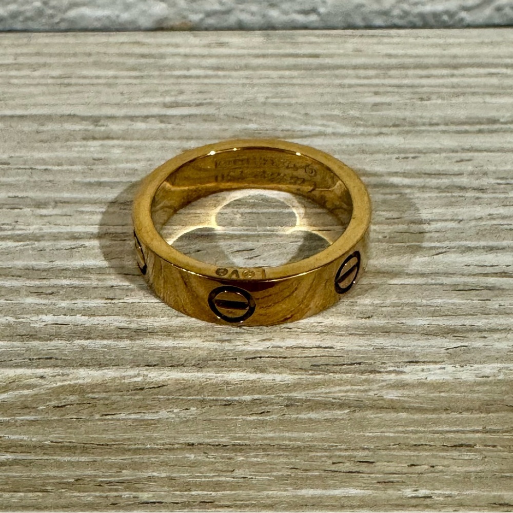 Love Inspired Designer Ring Gold. Size 7. Stainless Steel